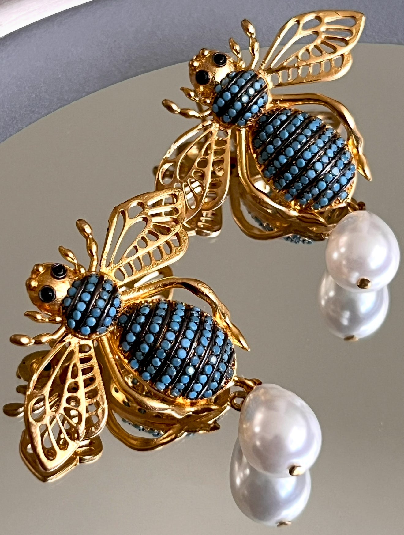 Aretes de chapa de oro