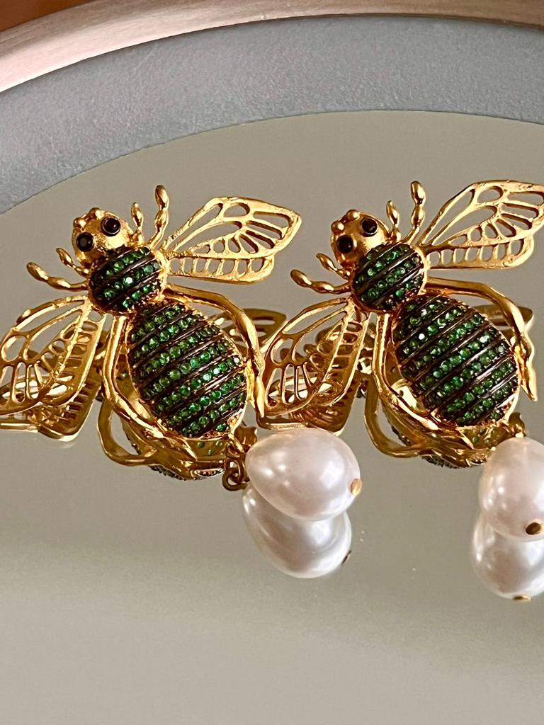Aretes de chapa de oro