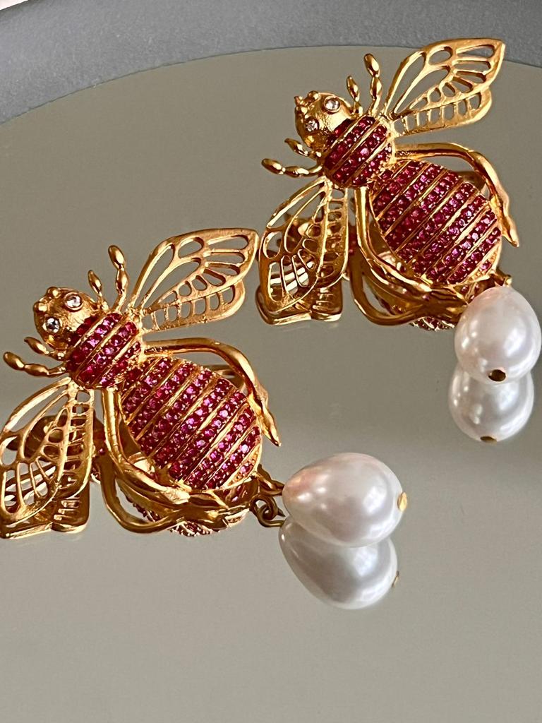 Aretes de chapa de oro