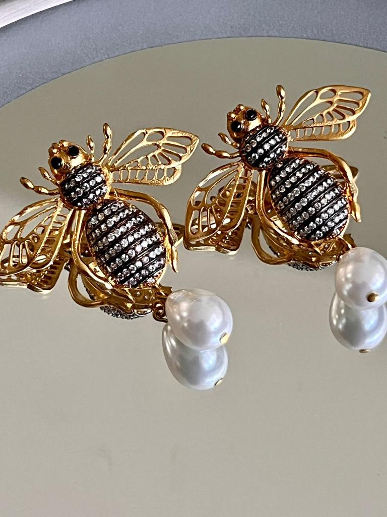 Aretes de chapa de oro